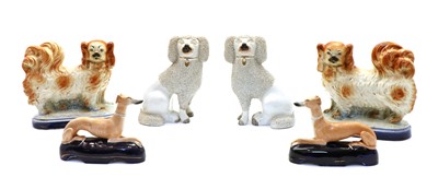 Lot 192 - Three pairs of Staffordshire pottery dogs