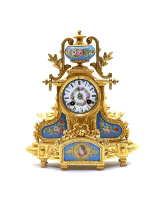 Lot 175 - A French Louis XVI revival gilt and porcelain cased mantel clock