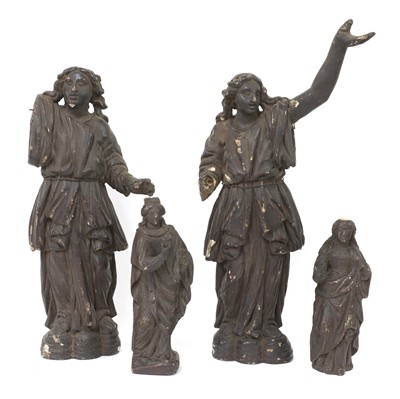 Lot 587 - A pair of early carved wooden angels