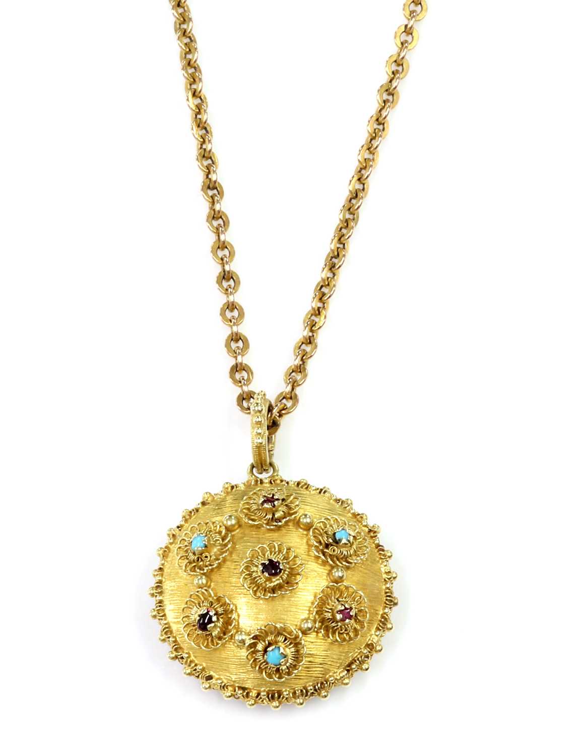 Lot 22 - A Regency gold circular gem set pendant, c.1820