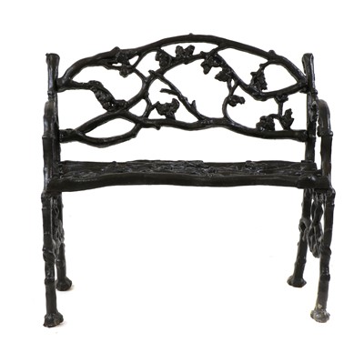 Lot 365 - A Coalbrookdale style cast iron garden seat