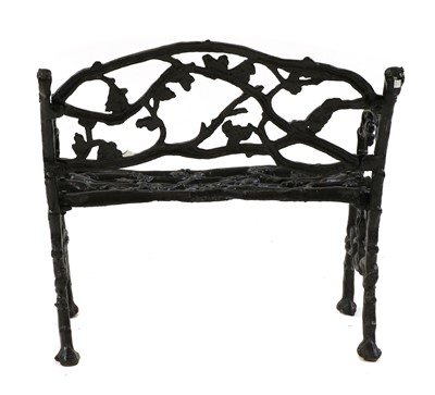 Lot 365 - A Coalbrookdale style cast iron garden seat