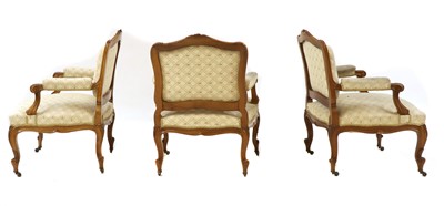 Lot 199 - A series of three Austrian walnut framed upholstered armchairs