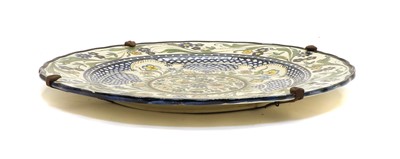 Lot 252 - A Continental pottery charger