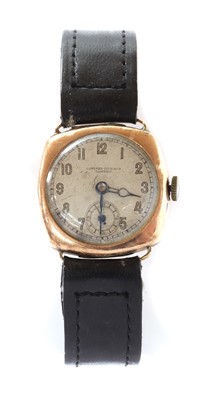 Lot 1531 - A mid-size 9ct gold mechanical strap watch