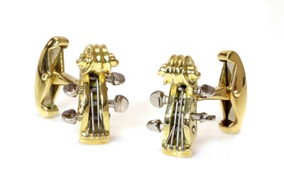 Lot 231 - A pair of 18ct yellow and white gold violin scroll cufflinks, by Deakin and Francis, retailed by Hamilton & Inches