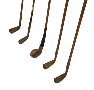 Lot 226 - A bag of old wooden shafted golf clubs