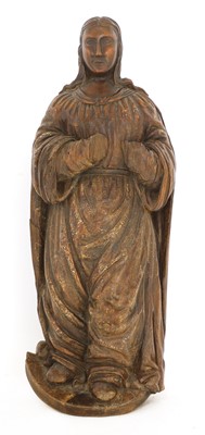 Lot 557 - A Continental carved wood figure of a saint