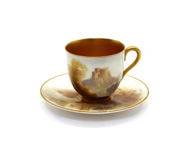 Lot 101 - A Royal Worcester porcelain cabinet cup and saucer