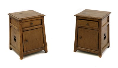 Lot 455 - A pair of Arts and Crafts-type oak bedside cabinets