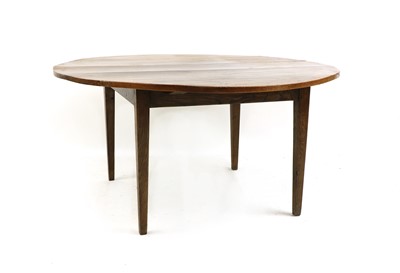 Lot 514 - A circular cherry dining table