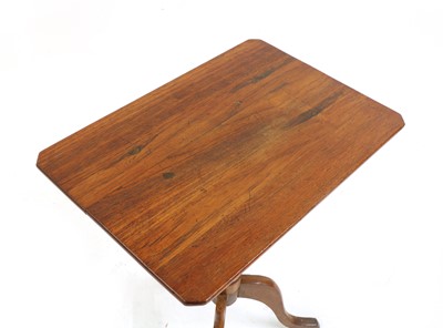 Lot 509 - A teak flip top occasional table