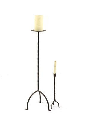 Lot 481 - Two barley twist wrought iron candlesticks