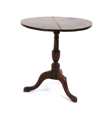 Lot 309 - A circular mahogany flip top table