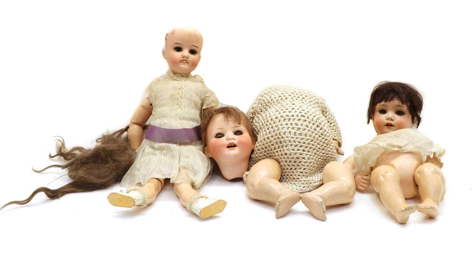 Lot 155 - Three bisque head dolls