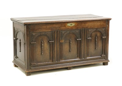 Lot 452 - A Continental carved oak coffer
