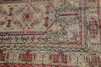 Lot 153 - A Turkish silk and gold-coloured metal rug