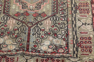 Lot 153 - A Turkish silk and gold-coloured metal rug