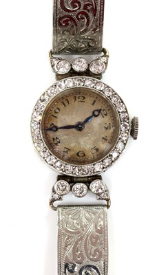 Lot 219 - An Art Deco ladies' diamond set mechanical cocktail watch, c.1925