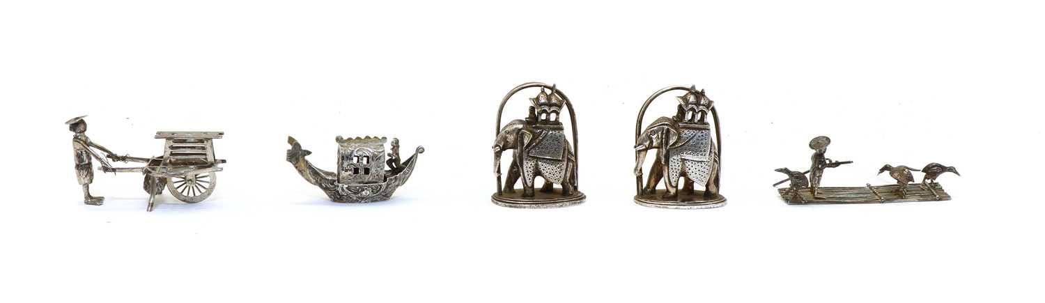 Lot 24 - A small late 19th century Chinese silver model of an oriental