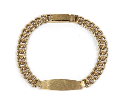 Lot 1117 - A gold identity bracelet