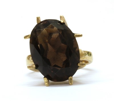 Lot 1245 - A 9ct gold single stone smoky quartz ring