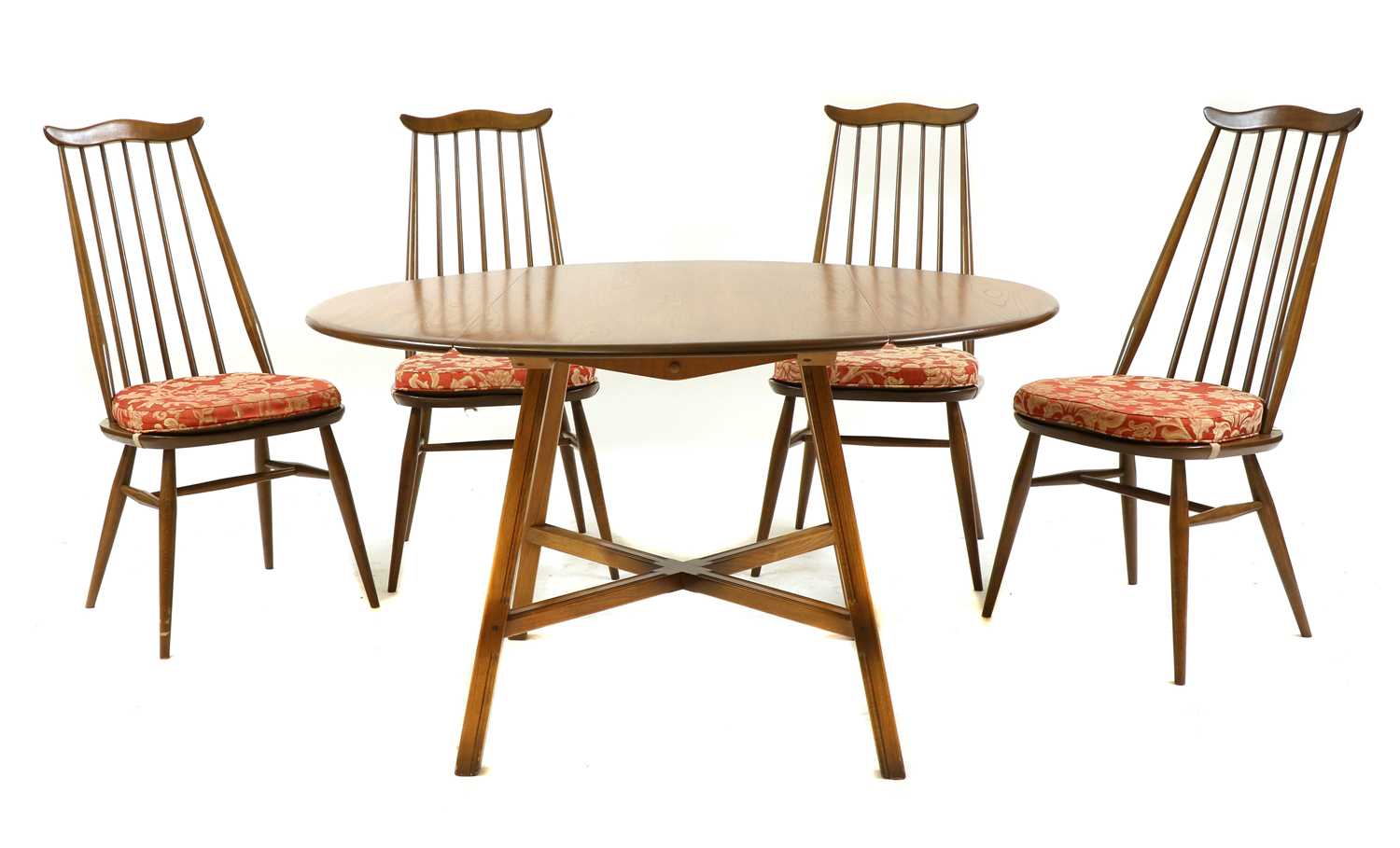 Lot 198 - An Ercol 'Windsor' dining table and four 'Goldsmith' chairs