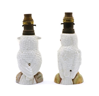 Lot 76 - Two Edwardian owl oil lamps