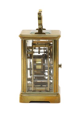 Lot 75 - A French brass carriage clock