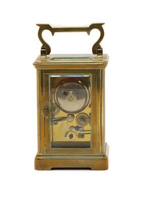 Lot 75 - A French brass carriage clock