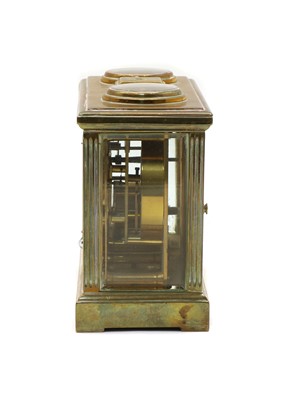 Lot 72 - A late 19th century brass combination carriage clock