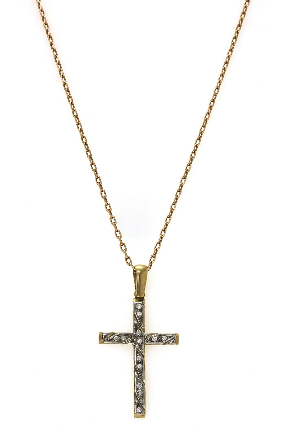 Lot 1146 - A 9ct gold cubic zirconia set cross pendant