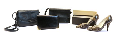 Lot 161 - An Eros black leather clutch bag