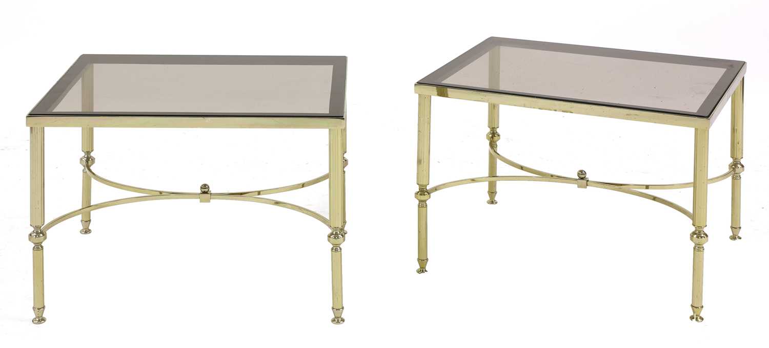 Lot 466 - A pair of brass side tables