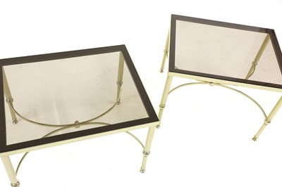 Lot 466 - A pair of brass side tables