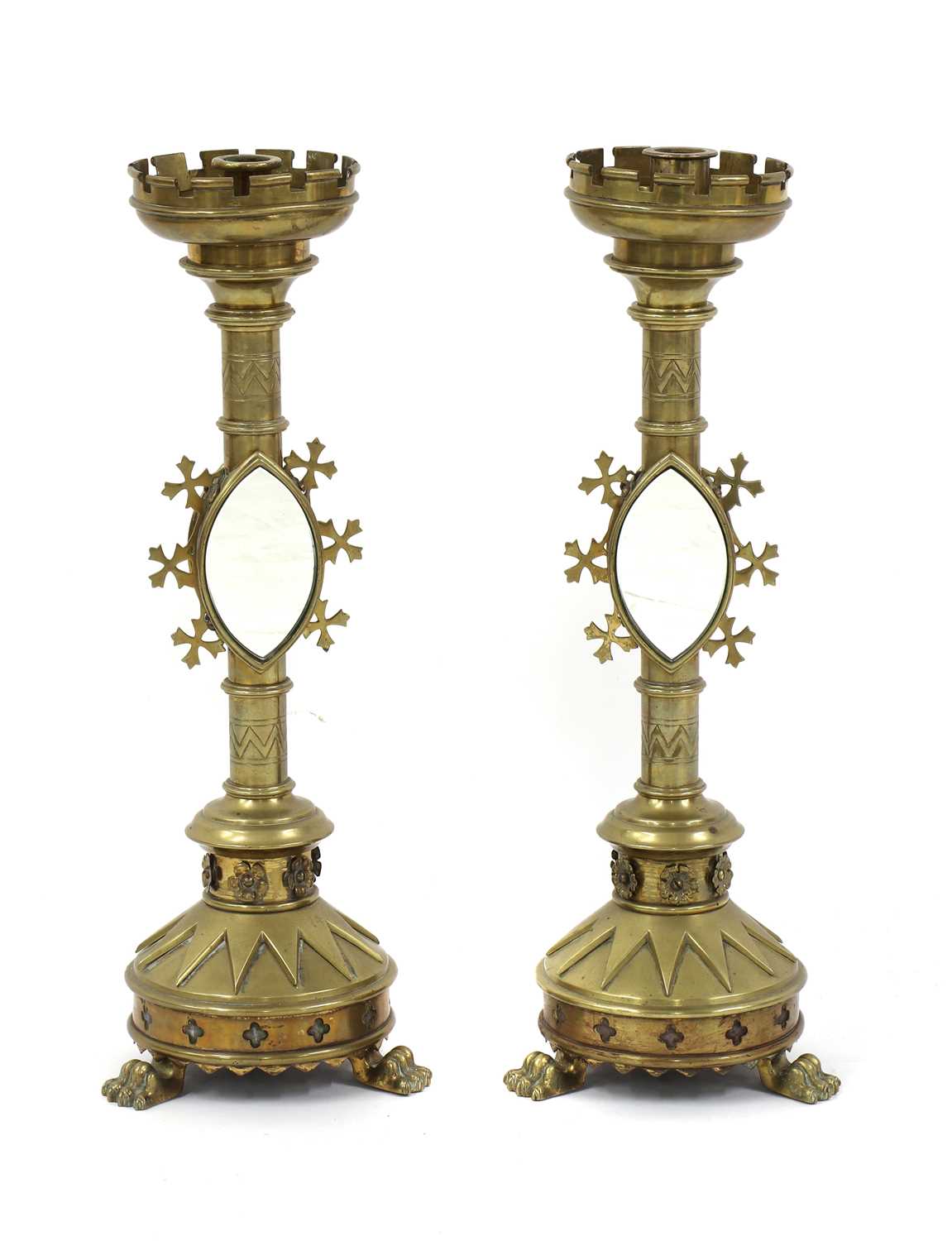Lot 52 - A pair of Gothic Revival brass candlesticks