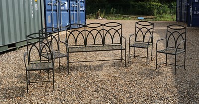 Lot 645 - A set of four modern wrought iron chairs