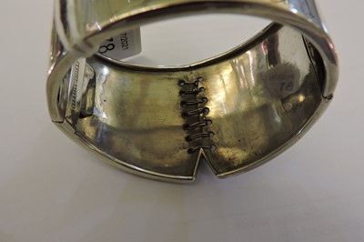 Lot 78 - A Victorian sterling silver hinged bangle of corset form