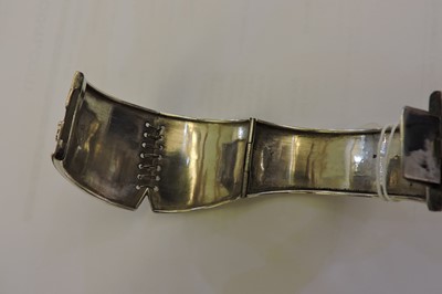 Lot 78 - A Victorian sterling silver hinged bangle of corset form