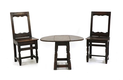 Lot 483 - A pair of French fruitwood child's chairs