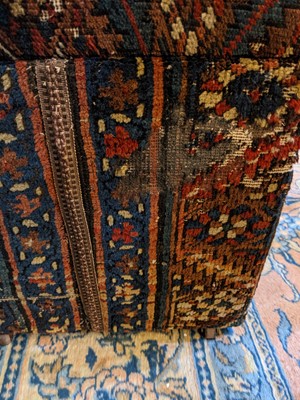 Lot 72 - A kilim ottoman