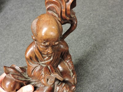 Lot 119 - Four Chinese wood carvings