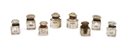 Lot 121 - Three pairs of glass ink bottles and a brass inkstand
