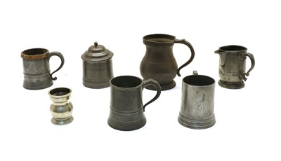 Lot 132 - 19 Victorian pewter tankards and measures