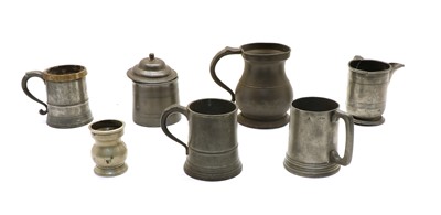Lot 132 - 19 Victorian pewter tankards and measures