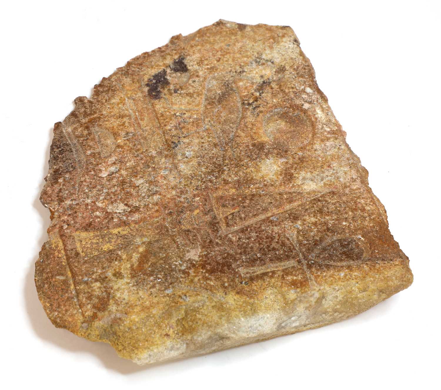 Lot 179 - An Egyptian inscribed quartzite fragment