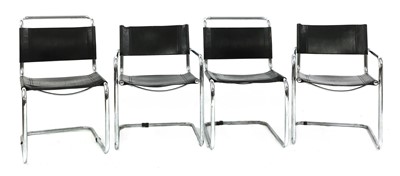 Lot 697 - Four chrome cantilever chairs
