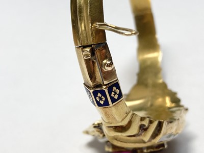 Lot 1 - A Swedish gold paste, split pearl and enamel hollow hinged bangle, c.1850