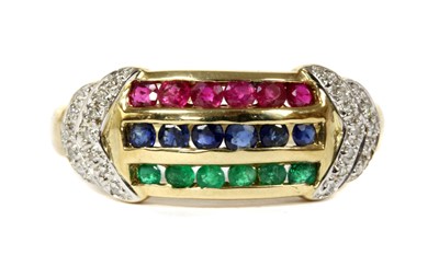 Lot 1215 - A 9ct gold ruby, sapphire, emerald and diamond ring