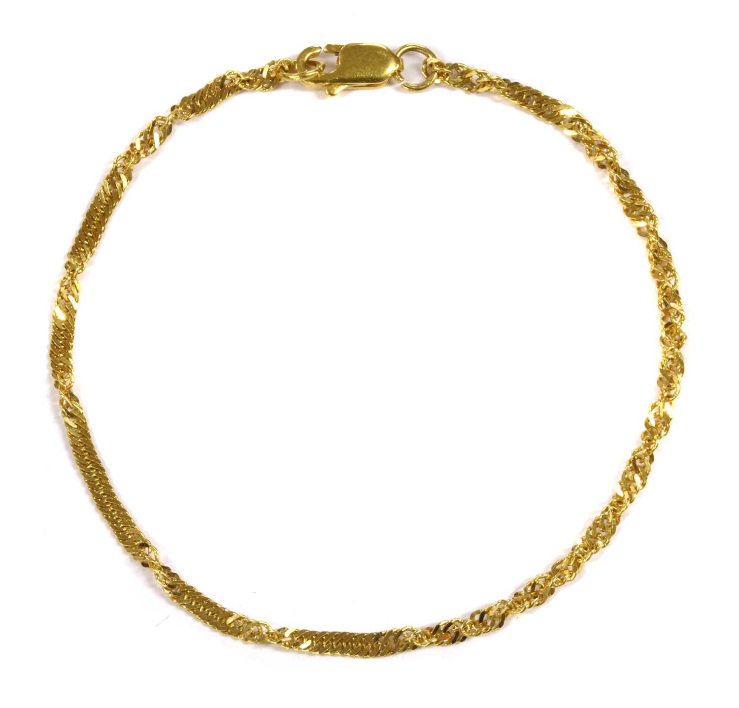 Lot 1119 - A 22ct gold twisted curb link bracelet